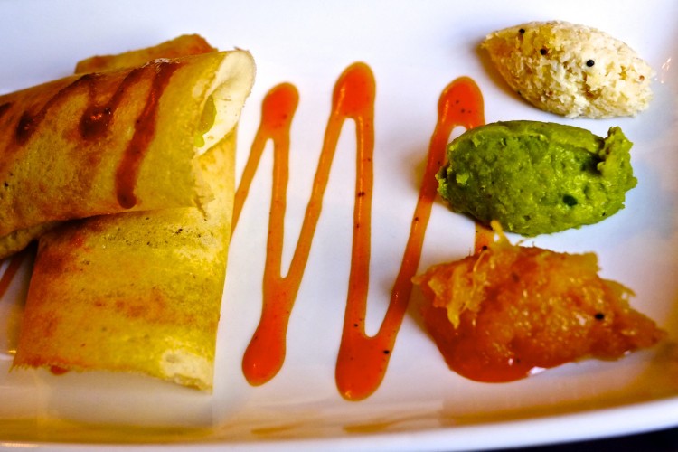 Dosai with spiced potatoes, Mustard, Onions and Coconut and Green Pea Chutney