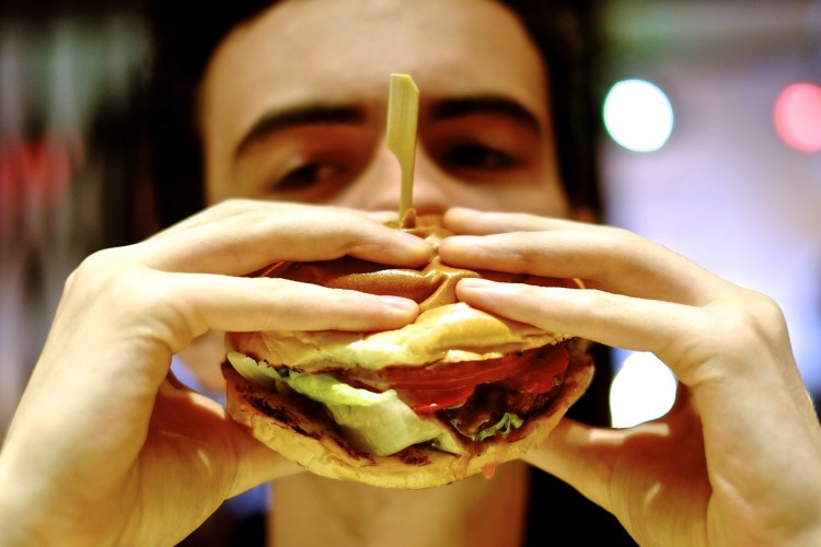 X Eating burger