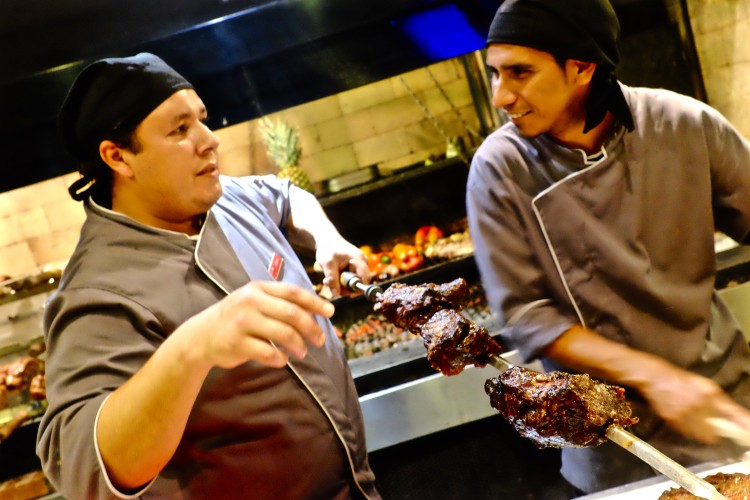 Meat on Skewer with two Chefs